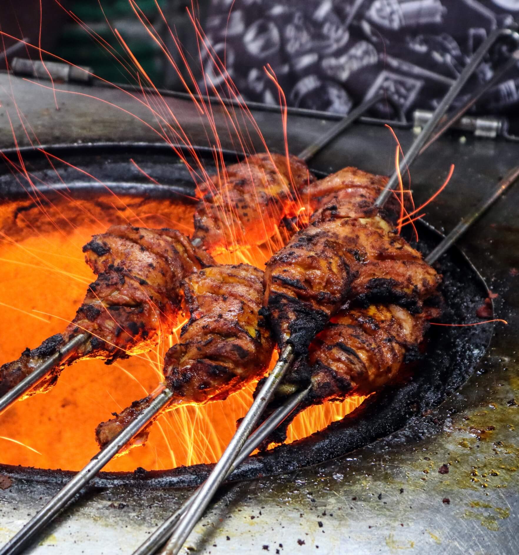 Image showing Tandoori Chicken cooked on fire flame oven with gas and charcoal